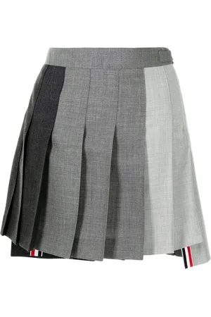 Thom Browne Minijupe plissée à ourlet plus long au dos