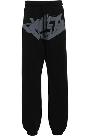 MARCELO BURLON Pantalon à imprimé graphique