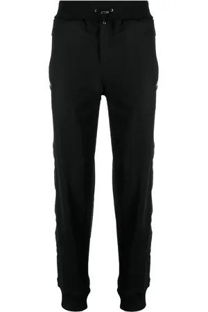 Philipp Plein Pantalon de jogging à boutons gravés