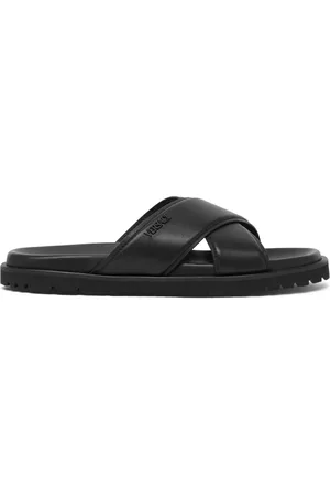 VERSACE Claquettes en cuir à logo