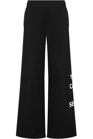 Moschino Pantalon en coton à logo imprimé