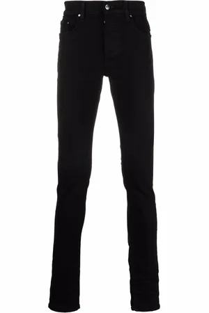 AMIRI Jean skinny à plaque logo