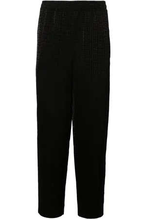 Balmain Pantalon satiné à motif monogrammé