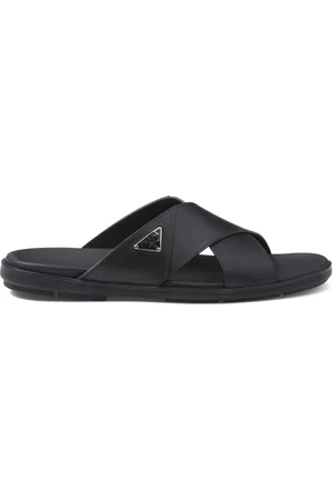 Prada Sandales en cuir verni à logo triangle