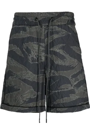 MOSTLY HEARD RARELY SEEN Short de sport matelassé à imotif camouflage