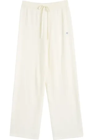Chinti & Parker X Peanuts pantalon à appliqué Snoopy