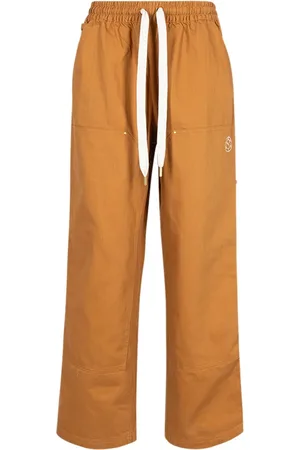 PUMA X Rhuigi pantalon à design superposé