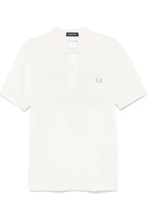 Comme des Garçons X Fred Perry polo à slogan imprimé
