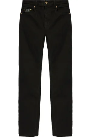 VERSACE Jean droit à empiècements