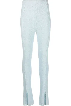 ROTATE Pantalon en maille à chevilles évasées