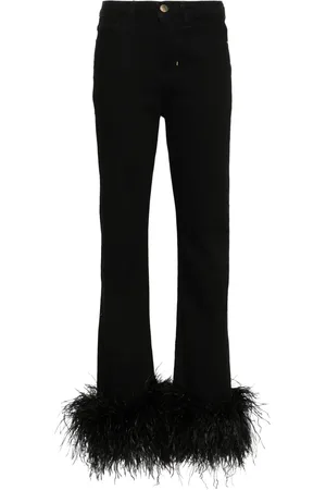 LOULOU Jean à détails de plumes