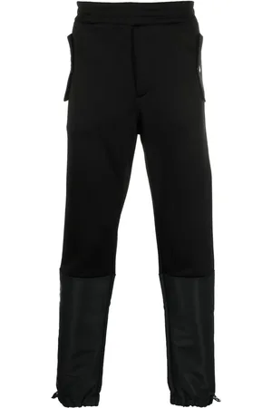 Alexander McQueen Pantalon de jogging fuselé à design à empiècements
