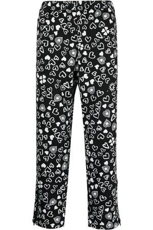Comme des Garçons Pantalon court à imprimé cœur