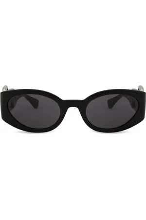 Moschino Lunettes de soleil à monture papillon