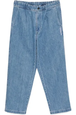 A Bathing Ape Jean à design plissé