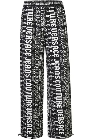 VERSACE Pantalon de jogging à logo imprimé
