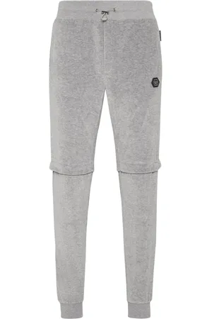 Philipp Plein Pantalon de jogging à boutons décoratifs