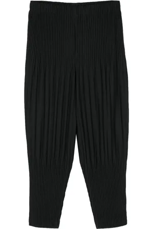 Issey Miyake Pantalon à effet plissé