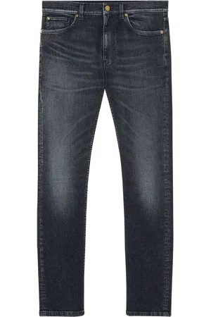 VERSACE Jean à motif Medusa