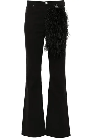 LOULOU Jean à détails de plumes