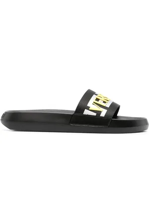 VERSACE Claquettes à logo La Greca en relief