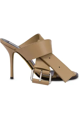 Moschino Mules en cuir à boucle