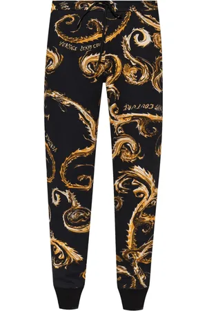 VERSACE Pantalon de jogging à logo imprimé