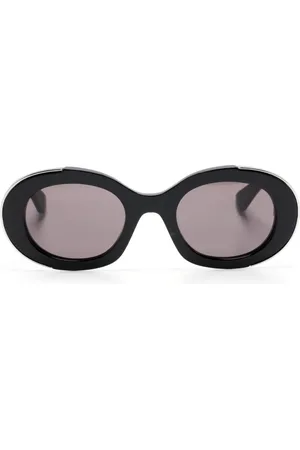 Alexander McQueen Lunettes de soleil ovales à logo gravé