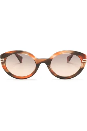 Vivienne Westwood Lunettes de soleil ovales à motif cœur