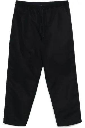 Comme des Garçons Pantalon à coupe fuselée