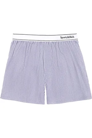 Sporty & Rich Short rayé à taille mi-haute