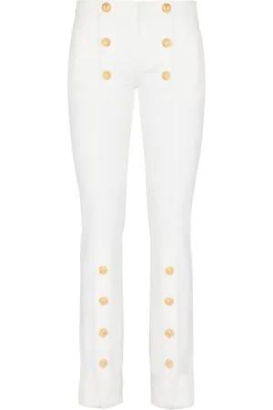 Balmain Jean slim à boutons décoratifs