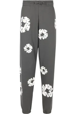 DENIM TEARS Pantalon de jogging à logo strassé
