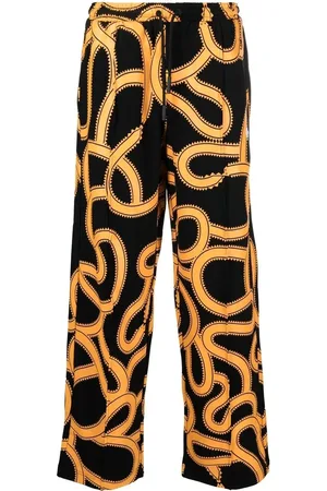 MARCELO BURLON Pantalon de jogging à imprimé Snake