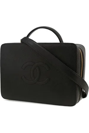 CHANEL Trousse de toilette en cuir (1999)