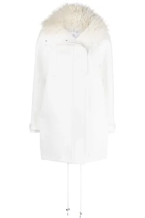 Courrèges Manteau oversize bordé de fourrure artificielle