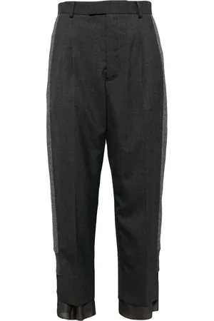 UNDERCOVER Pantalon à design superposé