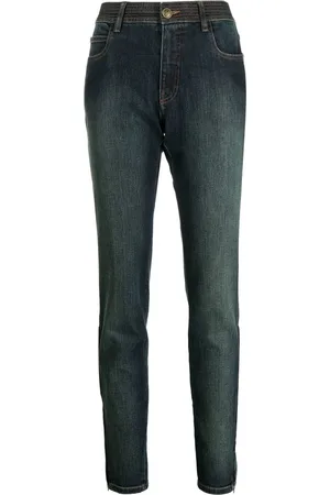 CHANEL Jean skinny à effet délavé