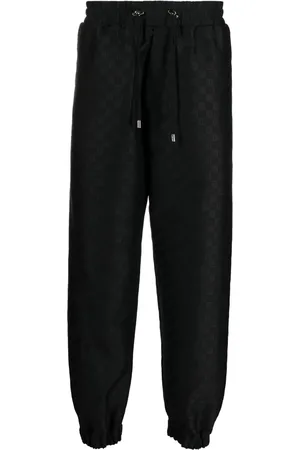 Balmain Pantalon de jogging à imprimé monogrammé
