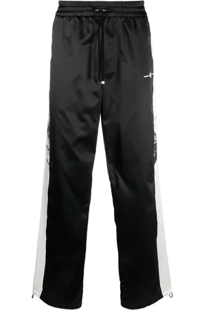 AMIRI Pantalon ample à rayures latérales