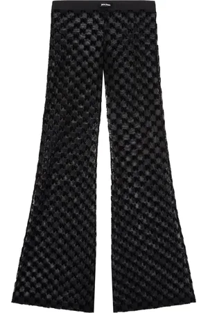 Palm Angels Pantalon monogrammé à coupe évasée