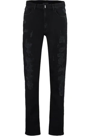Givenchy Jean slim à effet usé