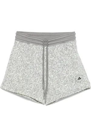 adidas Short de sport à logo en relief