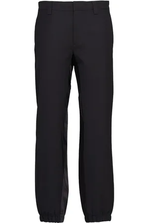 Prada Pantalon en laine à plaque logo