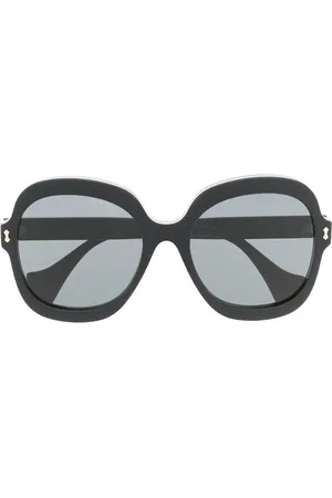 Gucci Lunettes de soleil à plaque logo