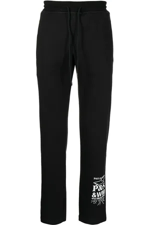 WHITE MOUNTAINEERING Pantalon de jogging à logo imprimé
