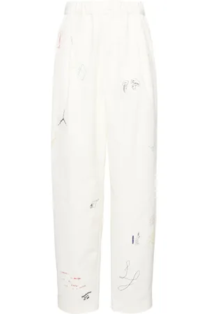 UNDERCOVER Pantalon à imprimé modèle
