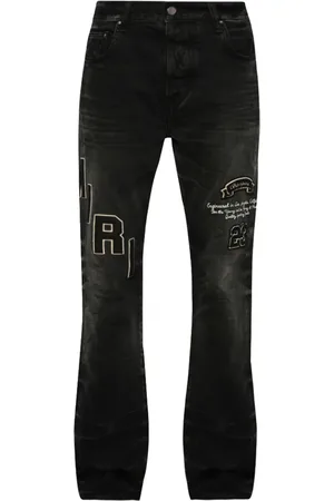 AMIRI Jean à effet-usé