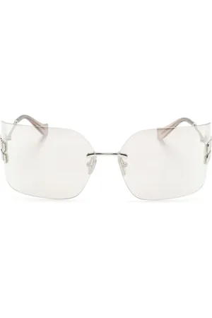 Miu Miu Lunettes de soleil couvrantes Runway