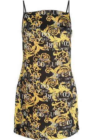 VERSACE Robe courte sans manches à logo imprimé